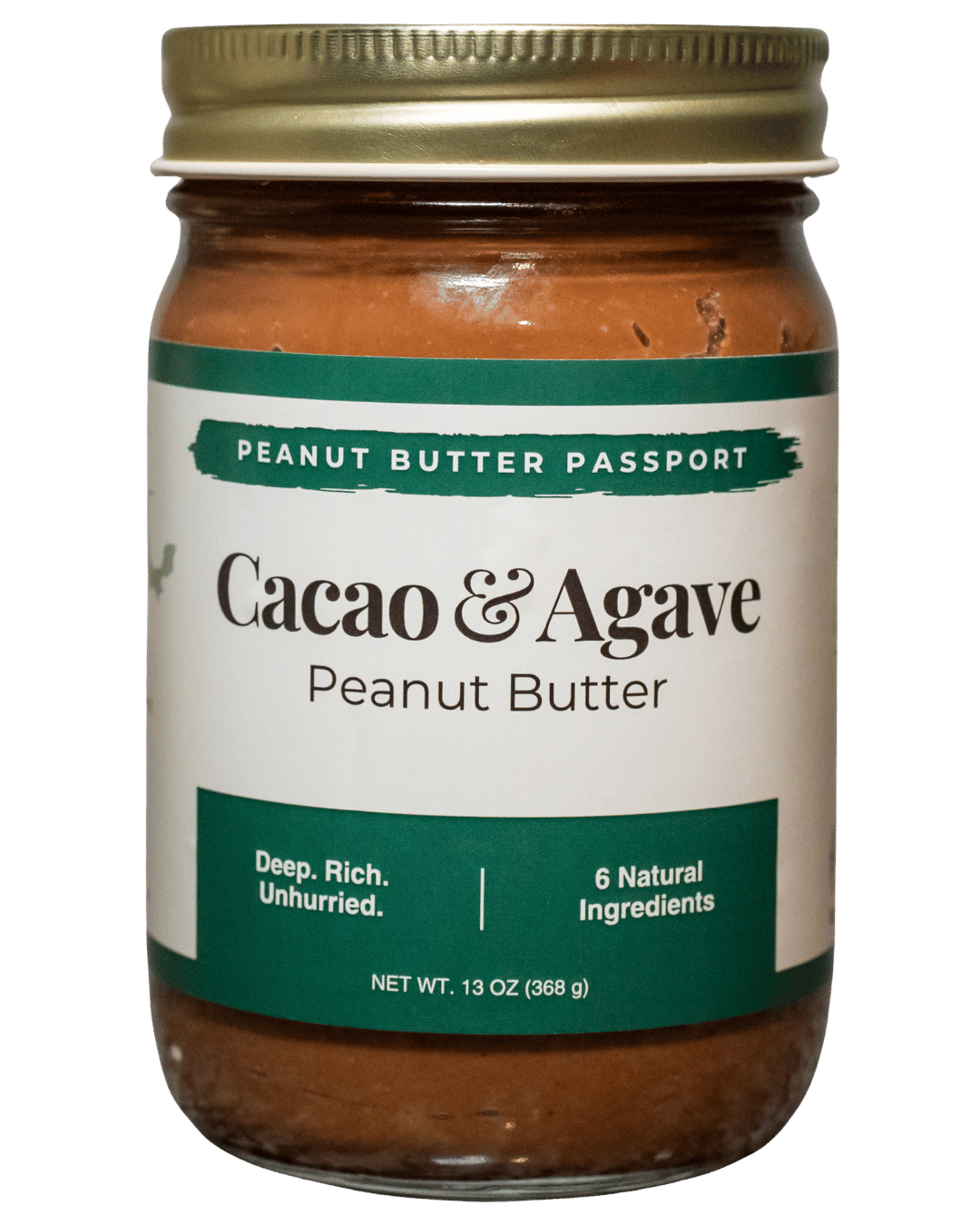 Jar of Cacao & Agave peanut butter with a gold lid on a transparent background