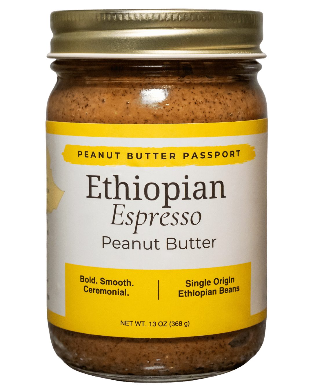 Jar of Ethiopian Espresso Peanut Butter with a gold lid on a green background