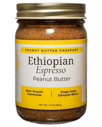 Jar of Ethiopian Espresso Peanut Butter with a gold lid on a green background