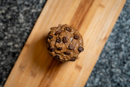 overhead photo of an opened jar of espresso peanut butter